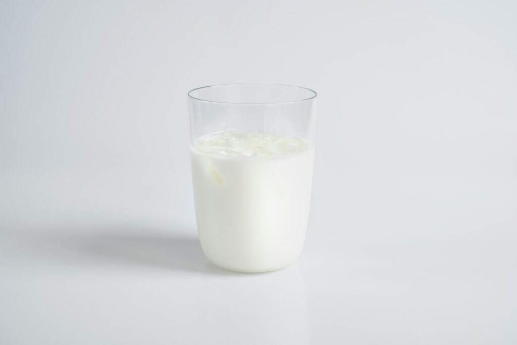 Premium unbranded dairy visual used temporarily until authentic Mimas photography is provided.
