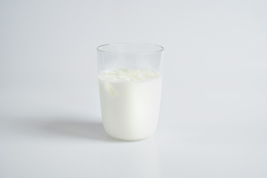 Premium unbranded dairy visual used temporarily until authentic Mimas photography is provided.